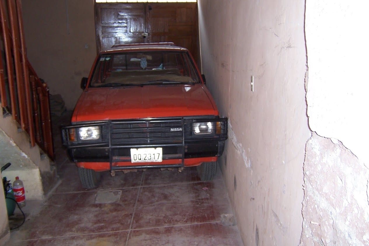 Badly parked car in Cusco hostel