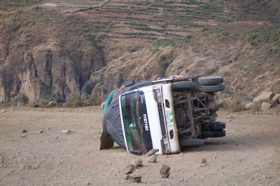 An overturned car seen when cycling the Blue Nile Gorge in Ethiopia
