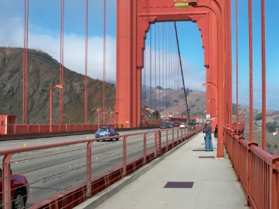 Cycling across the Golden Gate Bridge of San Francisco 