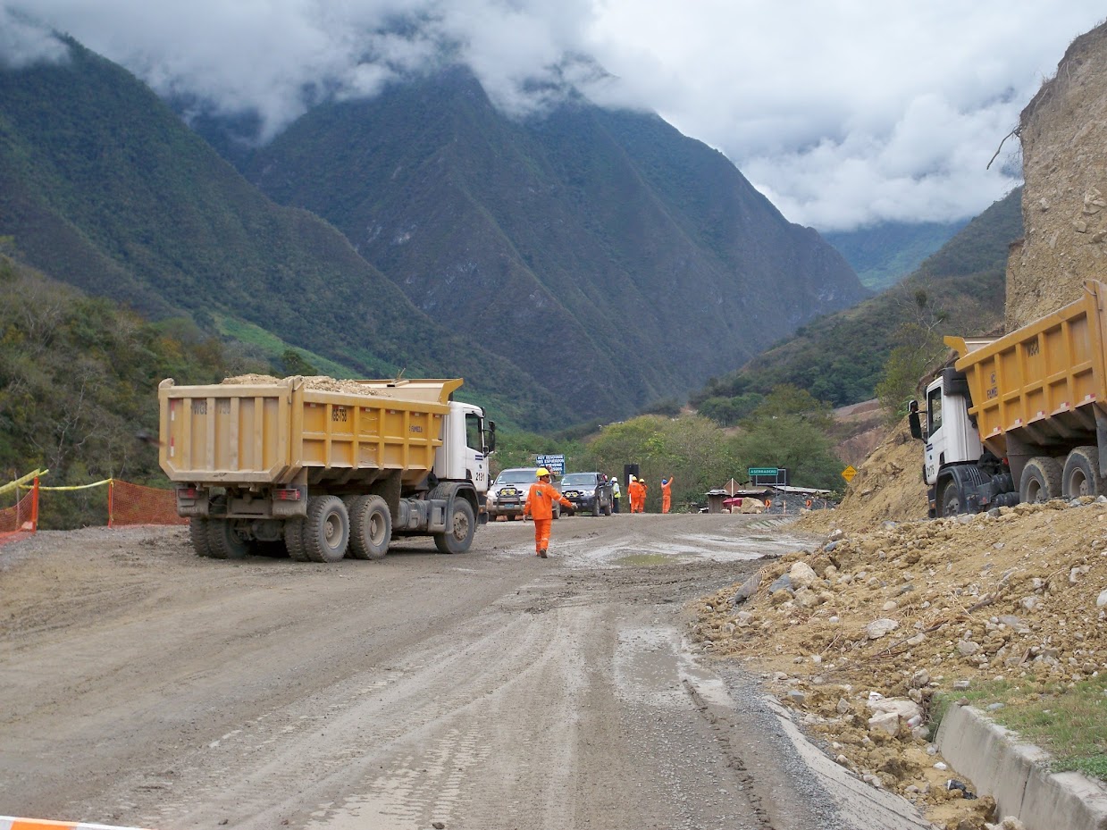 Biking past roadworks in Peru