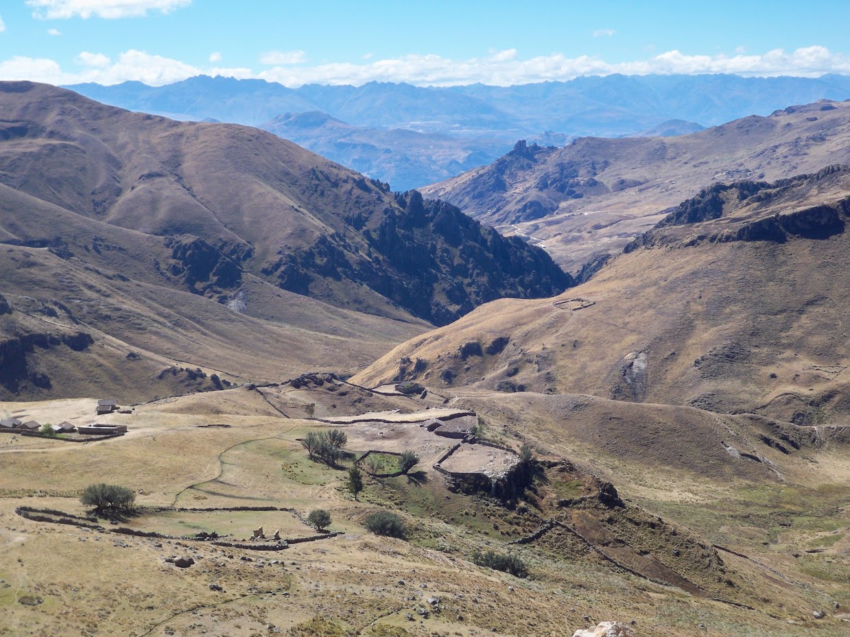 Cycling past some remote farms in the Andes of Peru