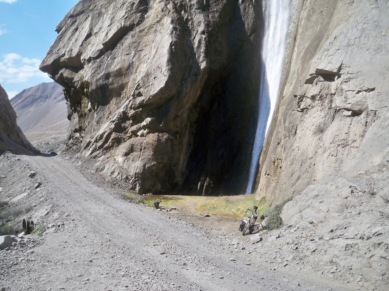 My bike by a waterfall in Peru