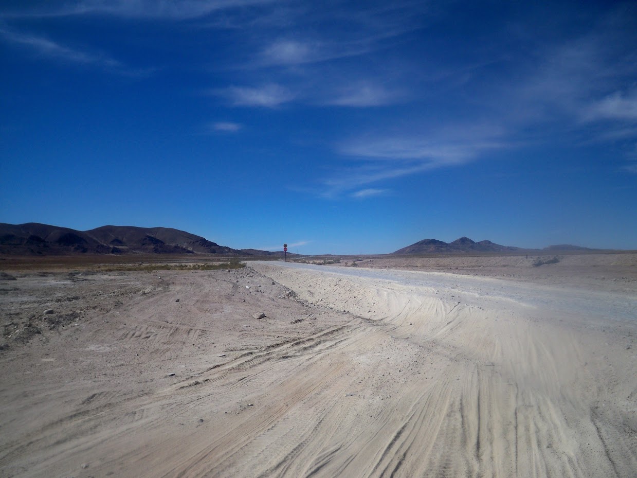 Cycling the road out of Uyuni in Bolivia