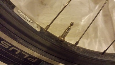 A Presta bike valve in the open position