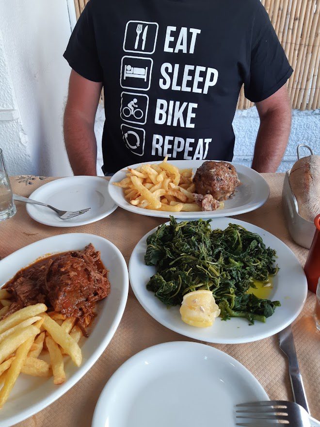 Dave eating food in Greece
