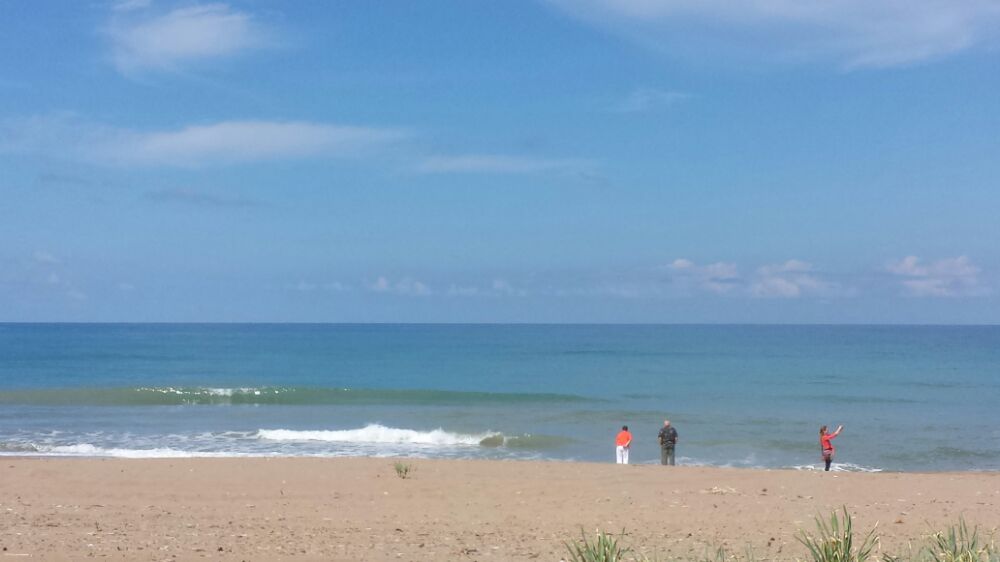 Visiting a long stretch of beach during our Peloponnese tour