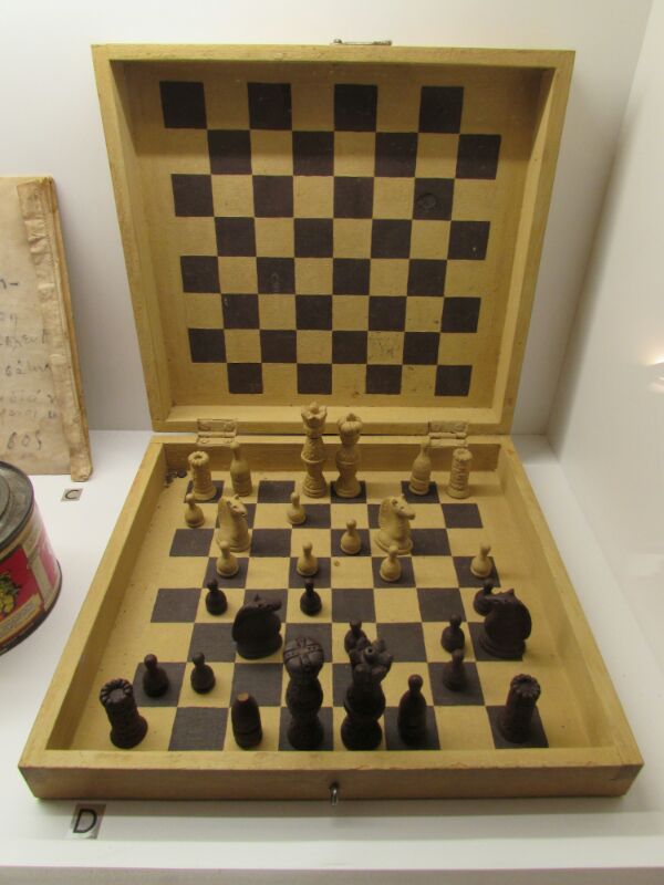Chess board in the Ai Stratis Political Exile Museum. The pieces are made of bread.