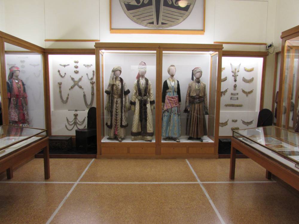 Greek national costumes on display inside the National Historic Museum in Athens Greece