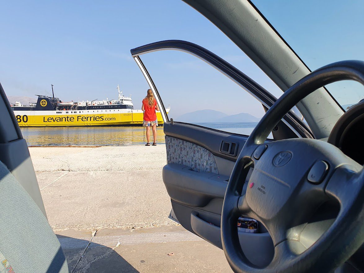 Seeing Greece by car and waiting for a ferry in Patras port