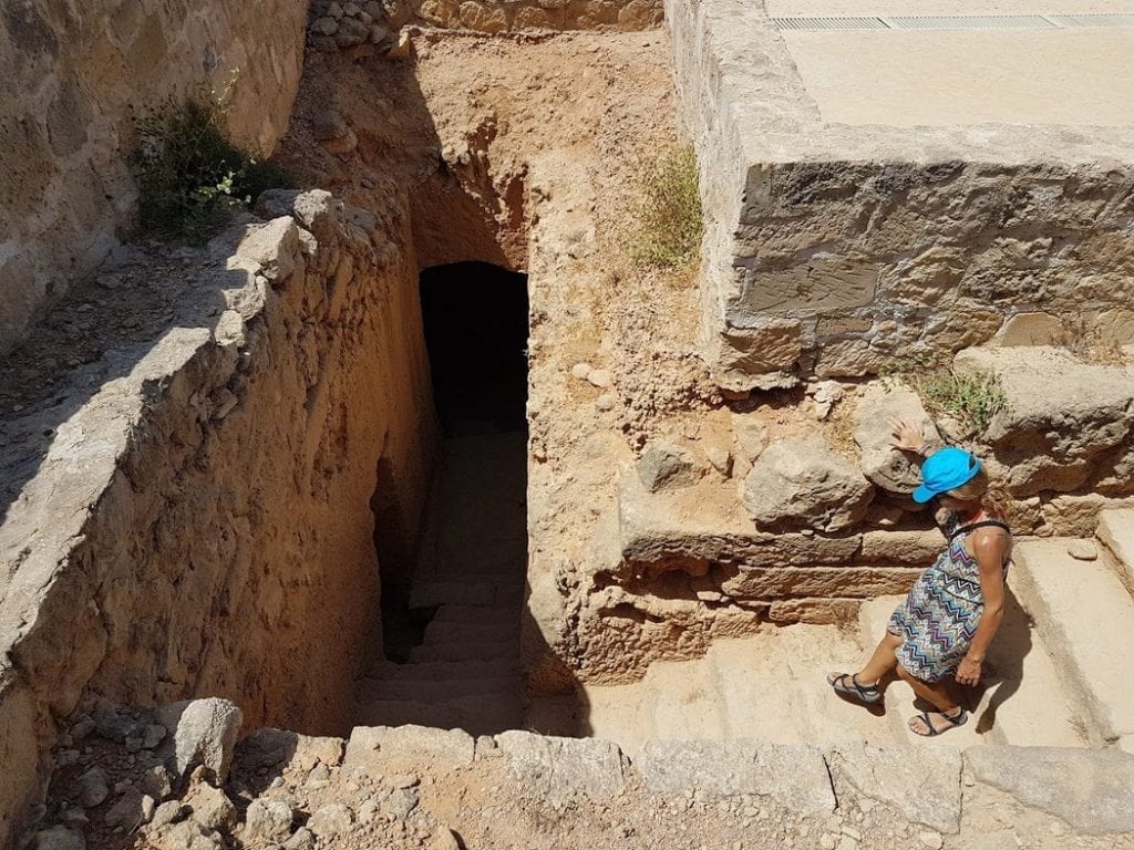 Walking down into one of the Tombs of the Kings in Paphos, Cyprus