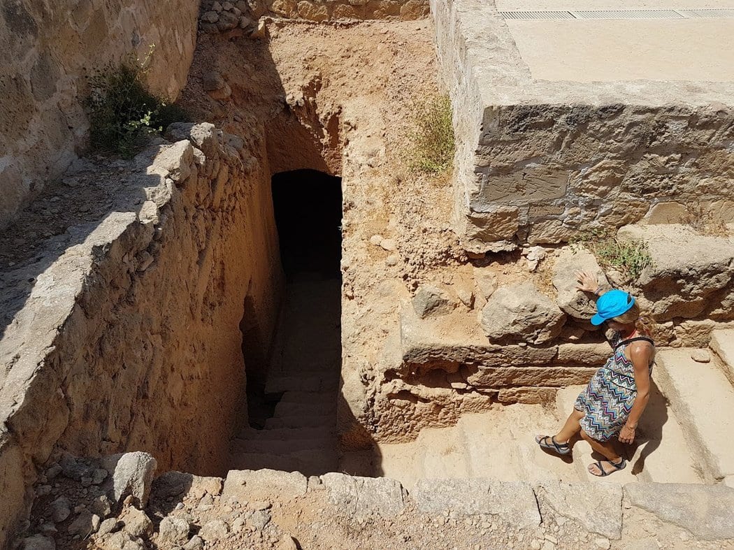 Walking down into one of the Tombs of the Kings in Paphos, Cyprus
