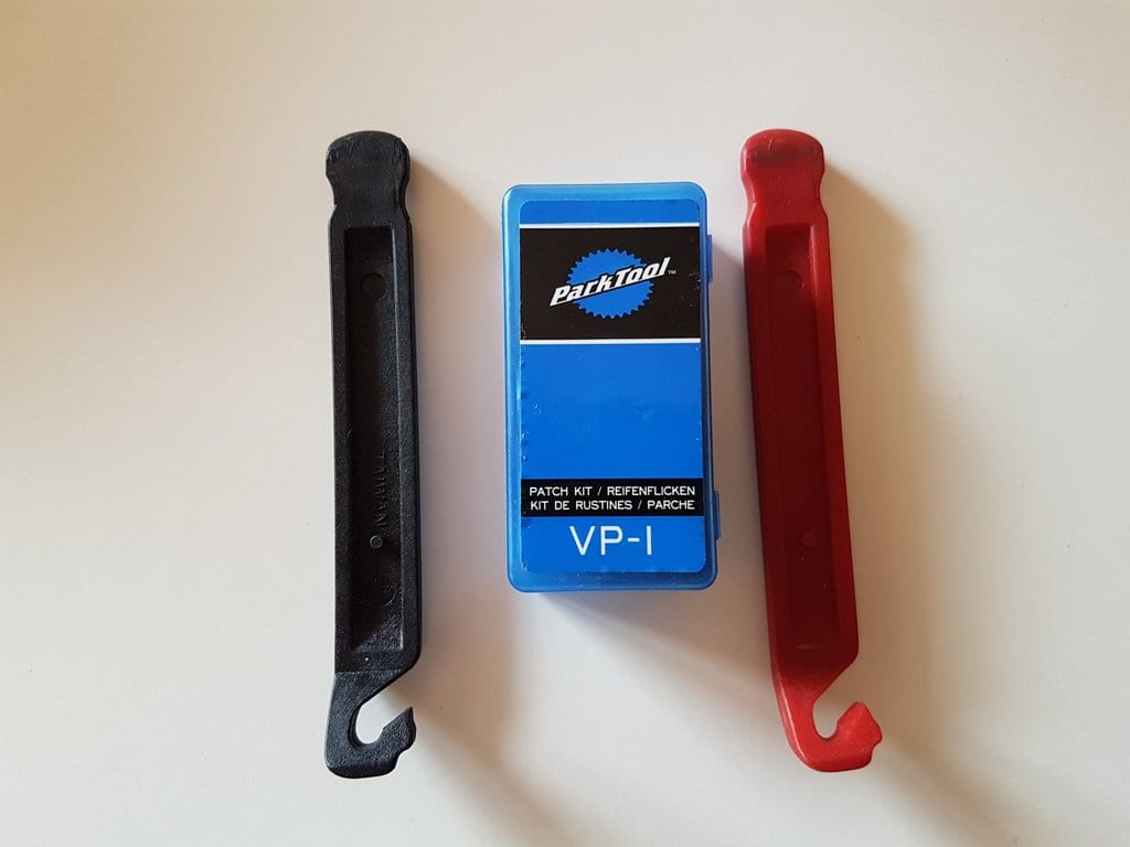 My puncture repair kit with tyre levers is one of my bike touring essentials