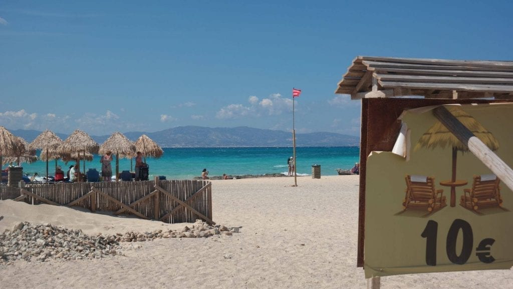 Make sure to get an umbrella on Chrissi beach in Greece