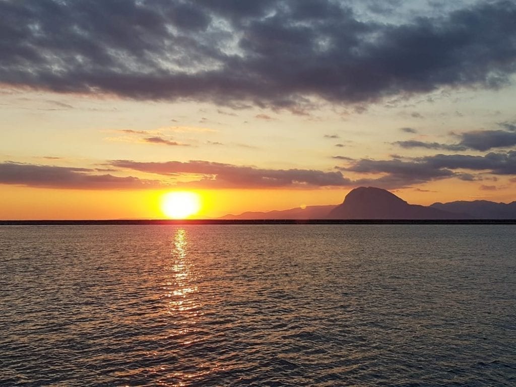 Visit the port area of Patras in order to see the sunset