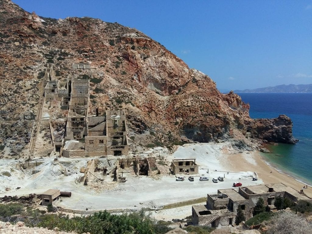 Abandoned sulphur mines acted as an incredible backdrop for Thiorichia beach in Milos, Greece