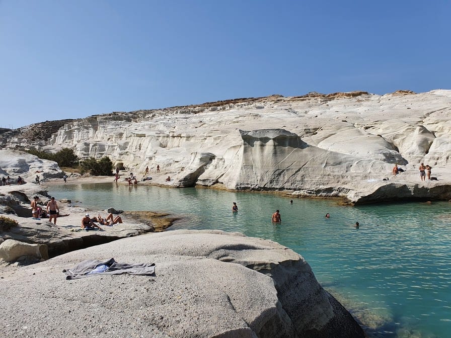 Swimming at Srakiniko Beach in Milos island Greece
