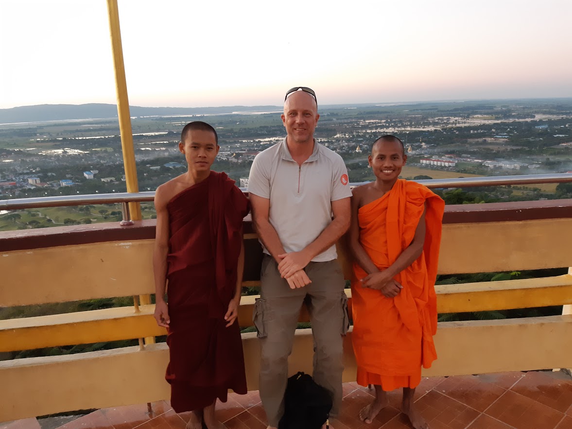 Chatting with Buddhist monks in a temple in Mandalay