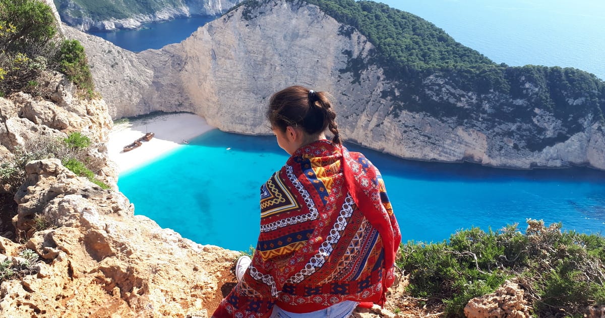 Visit the famous Shipwreck beach and Blue Caves in a glass-bottom boat