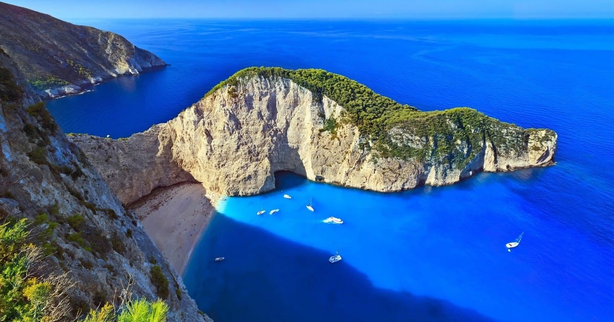 Visit the famous Shipwreck beach, Blue Caves and a winery 