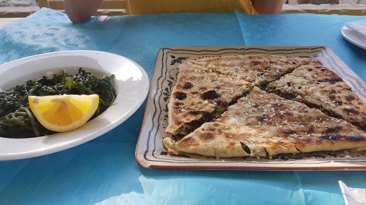 Eating a delicious pie in Mani