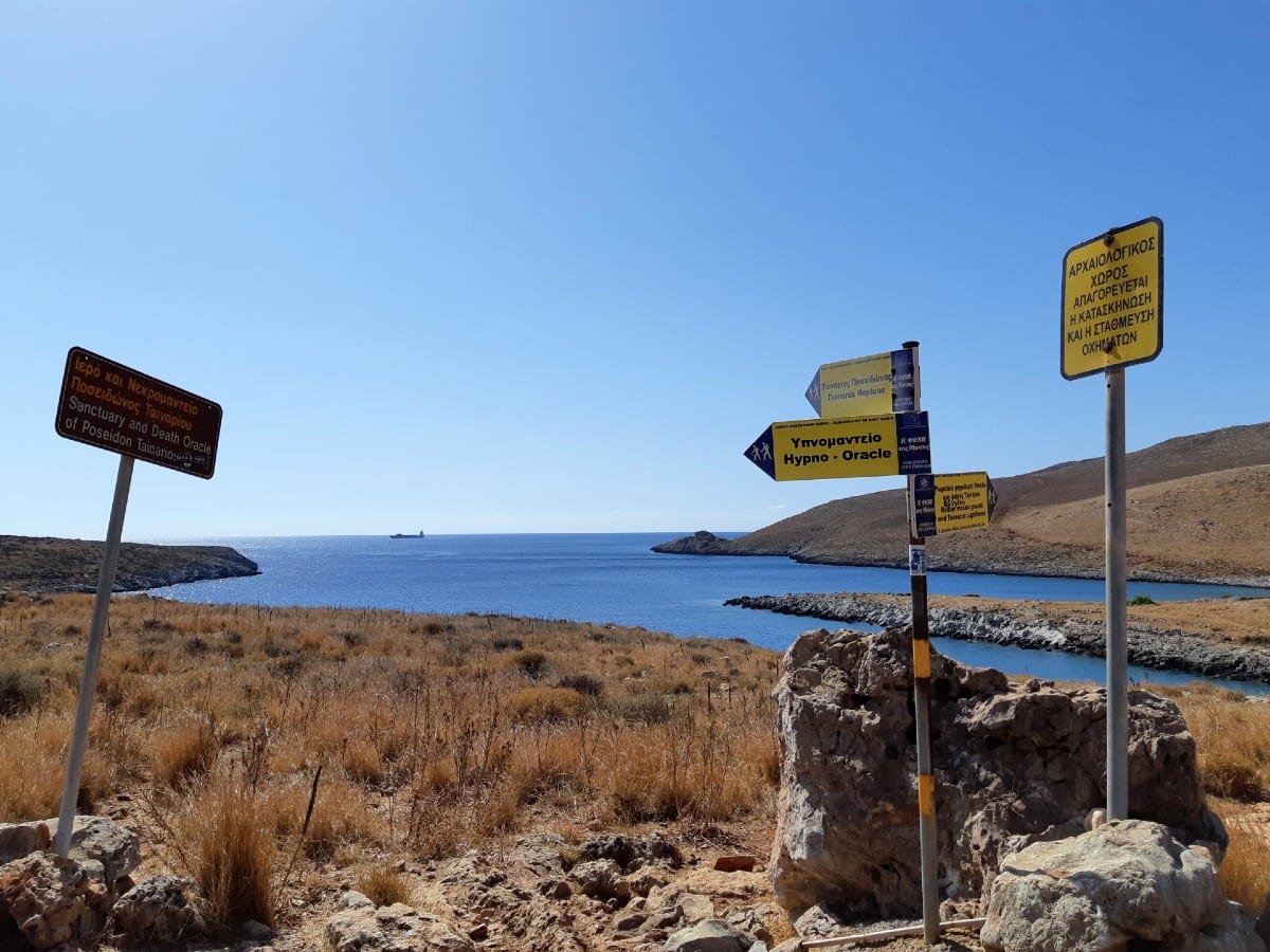 Clearly marked signs for the hiking path at Cape Tainaron in Greece