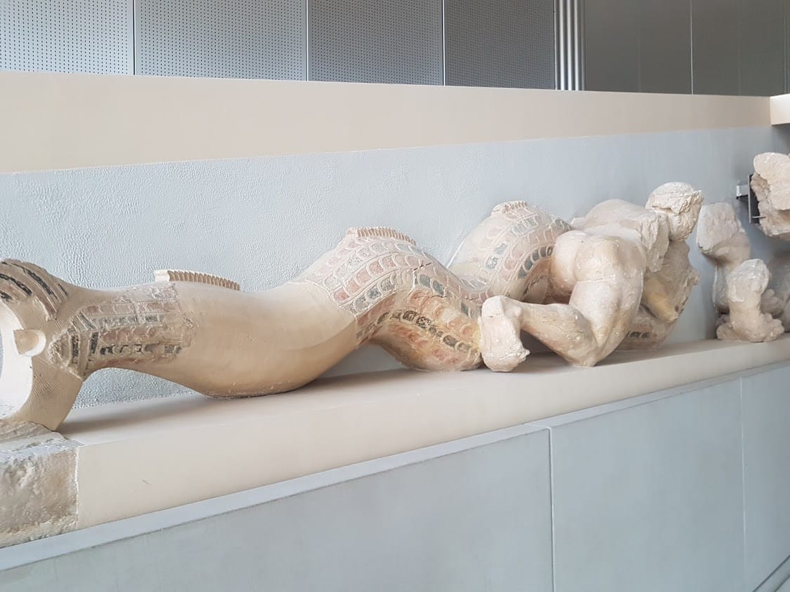 One of the interesting facts about ancient Greece is that the statues were not white, but painted as we can see here from this statue in the Acropolis Museum of Athens, Greece.