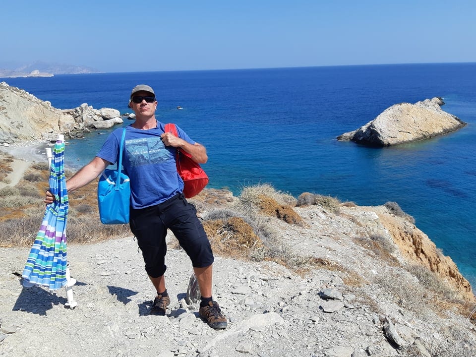 Dave striking an epic pose at Katergo beach in folegandros