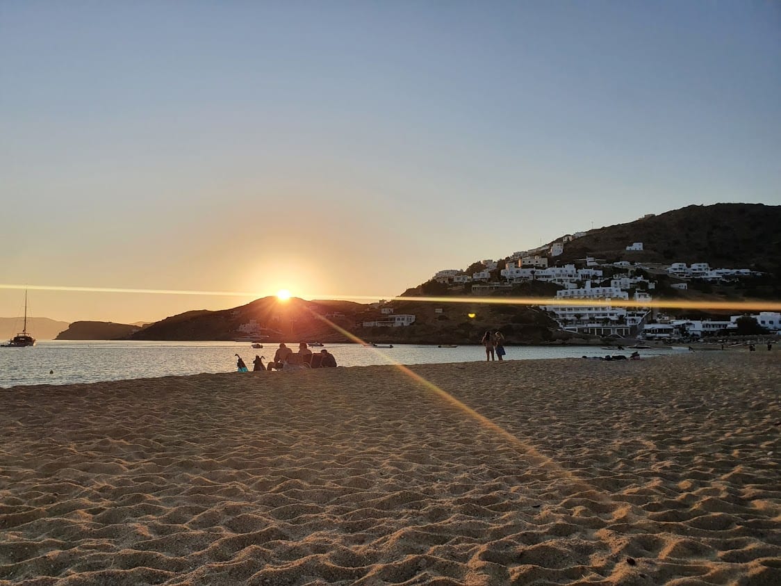 Enjoying the sunset on Mylopotas beach in Ios Greece