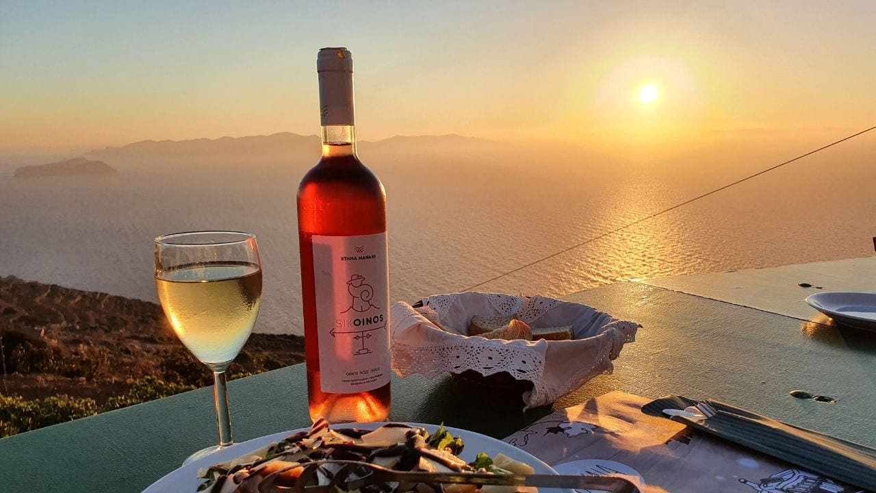 Enjoying a sunset meal at the winery in Sikinos island