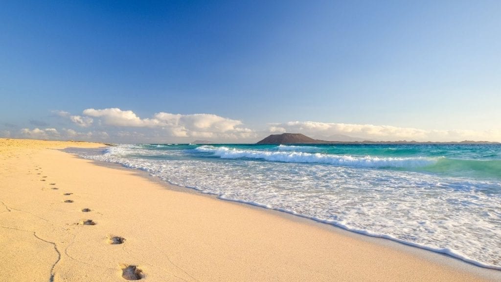 Enjoying the beach in the warm weather of the Canary islands in winter