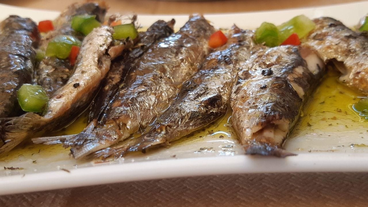 Eating a fish dish in Lavrio