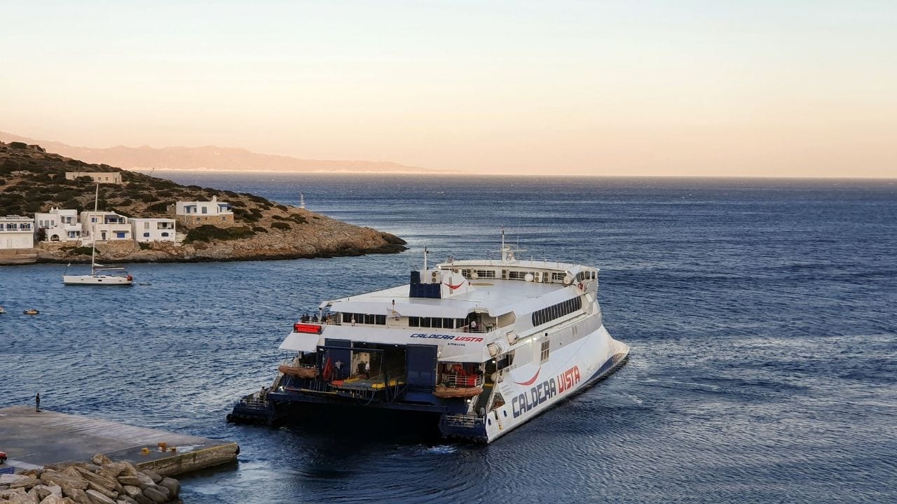 A ferry arriving at the small port in Sikinos island in Greece