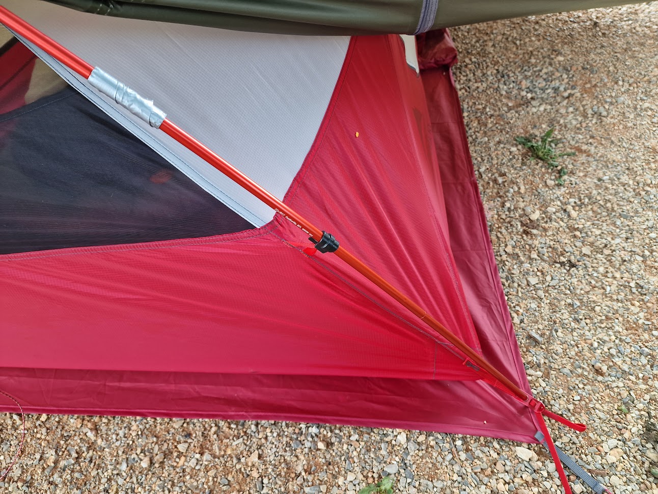 Silver tape being used as a temporary repair on my tent pole