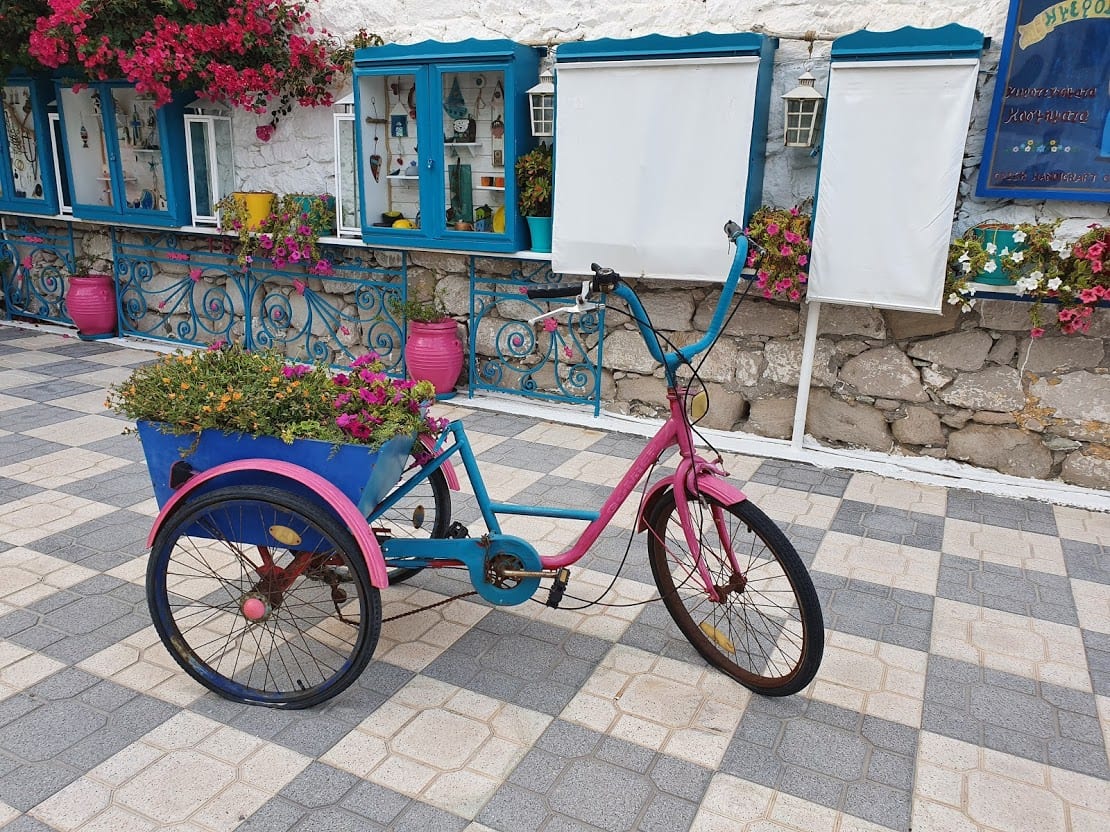 The well photographed pink bicycle in Adamantas Milos