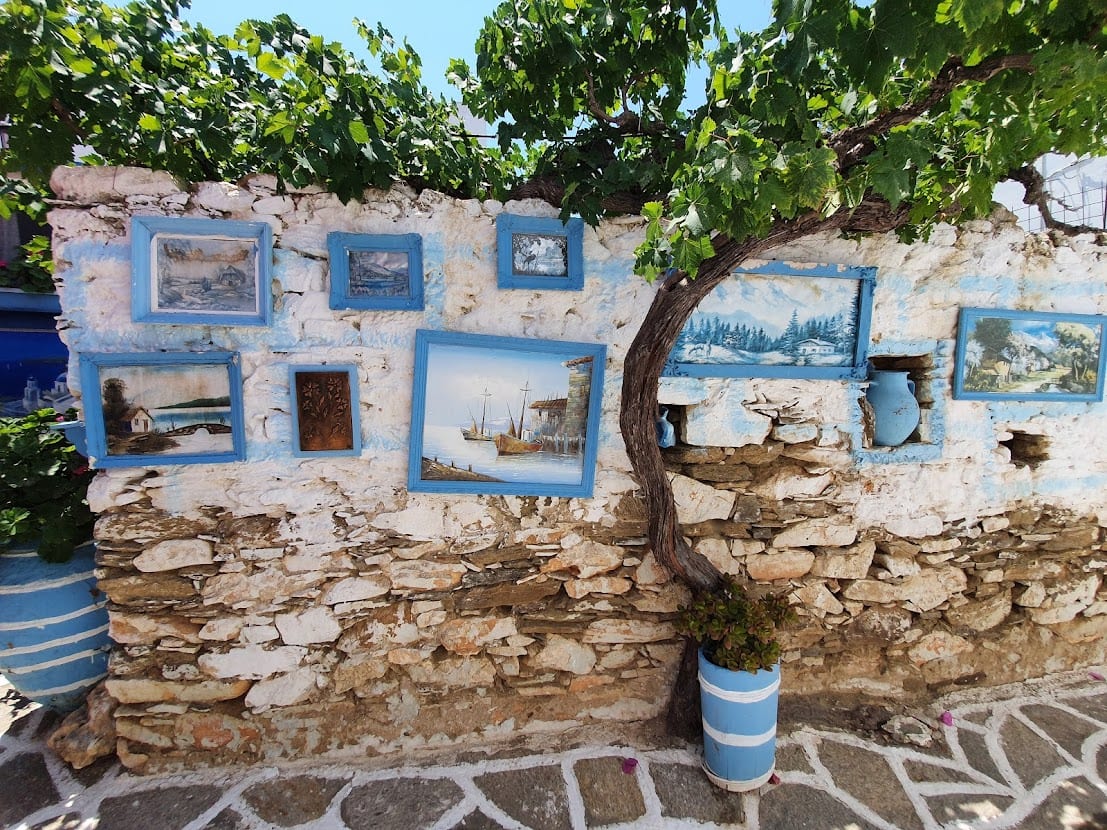 Artwork hanging outside in Prodromos in Paros