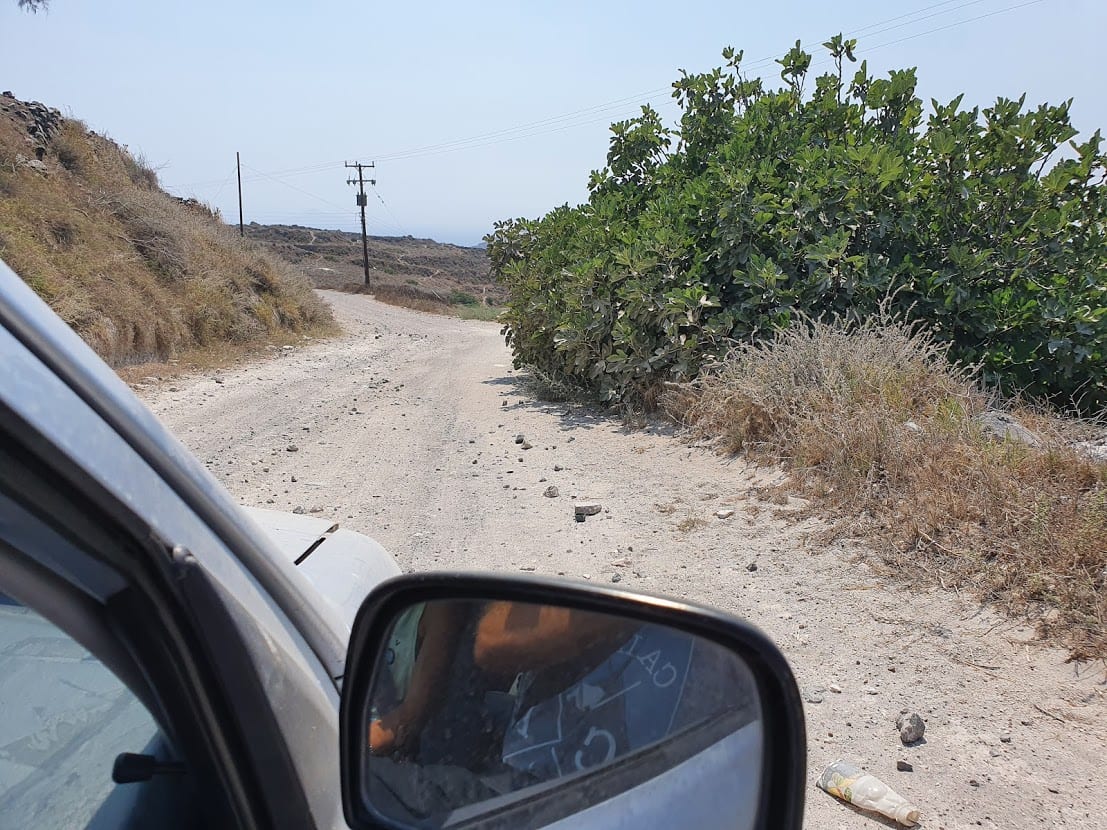 Driving on a dirt road in Santorini