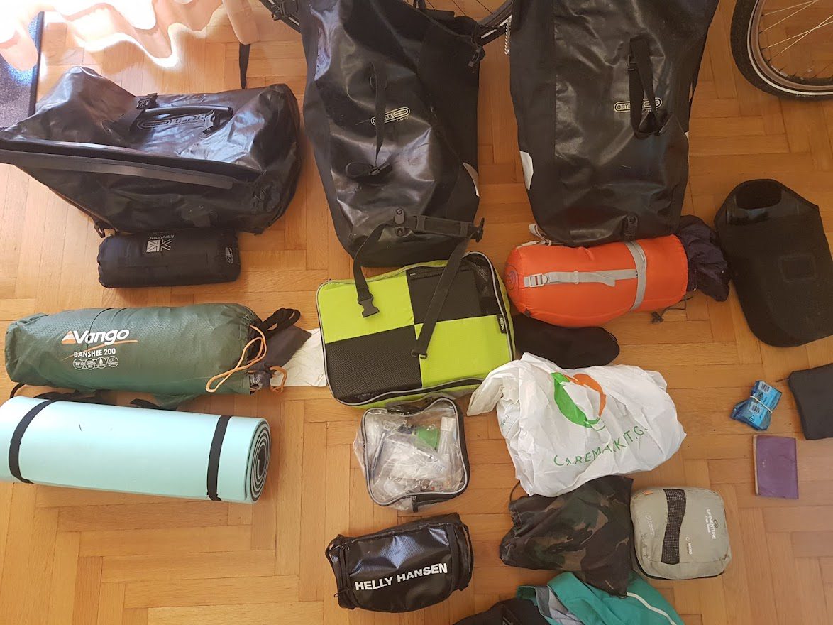 Bike touring gear with laptop wrapped in packing cube