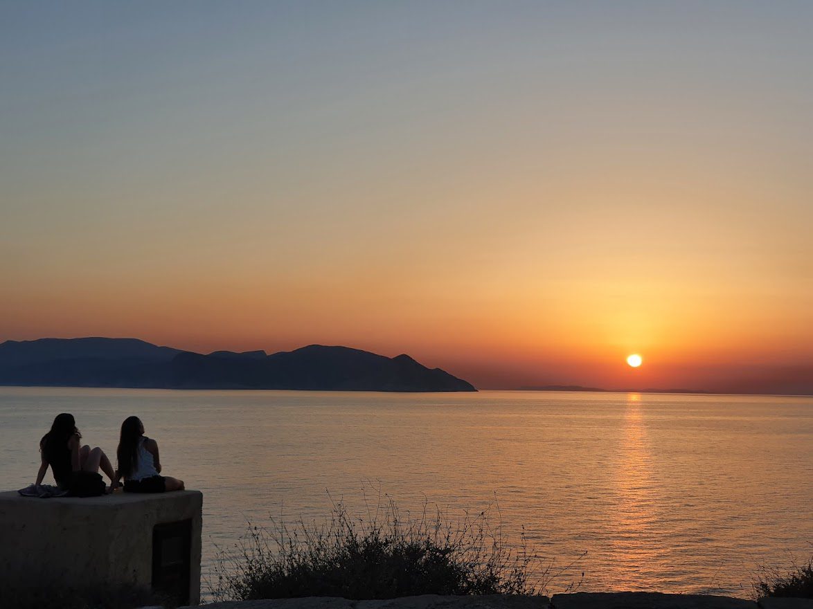 Watching sunset in Ios island