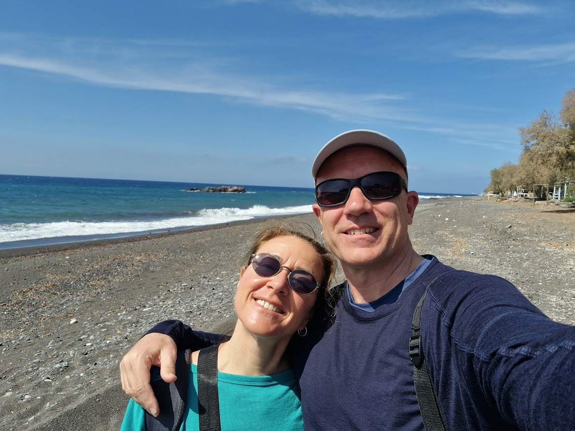 Dave from Dave's Travel Pages on Kamari Beach in March in Santorini