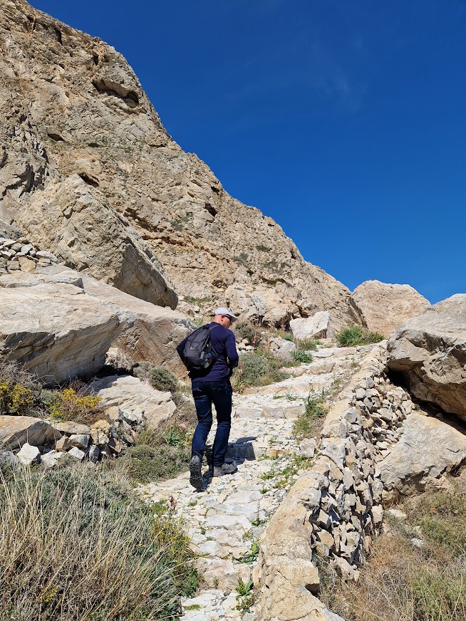 Dave walking up the path from Kamari in Santorini going to Ancient Thera