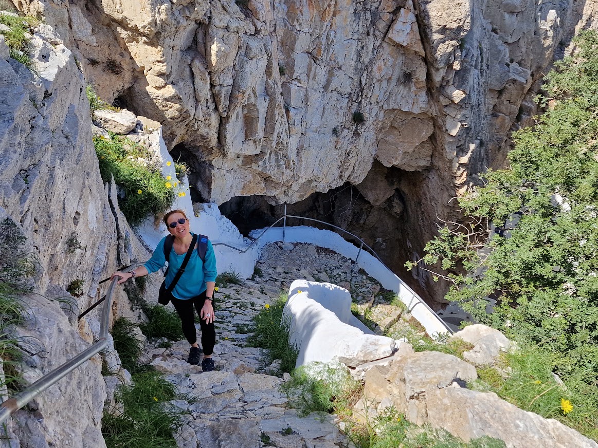 Vanessa walking up from Spring of Zoodochos Pigi in Santorini