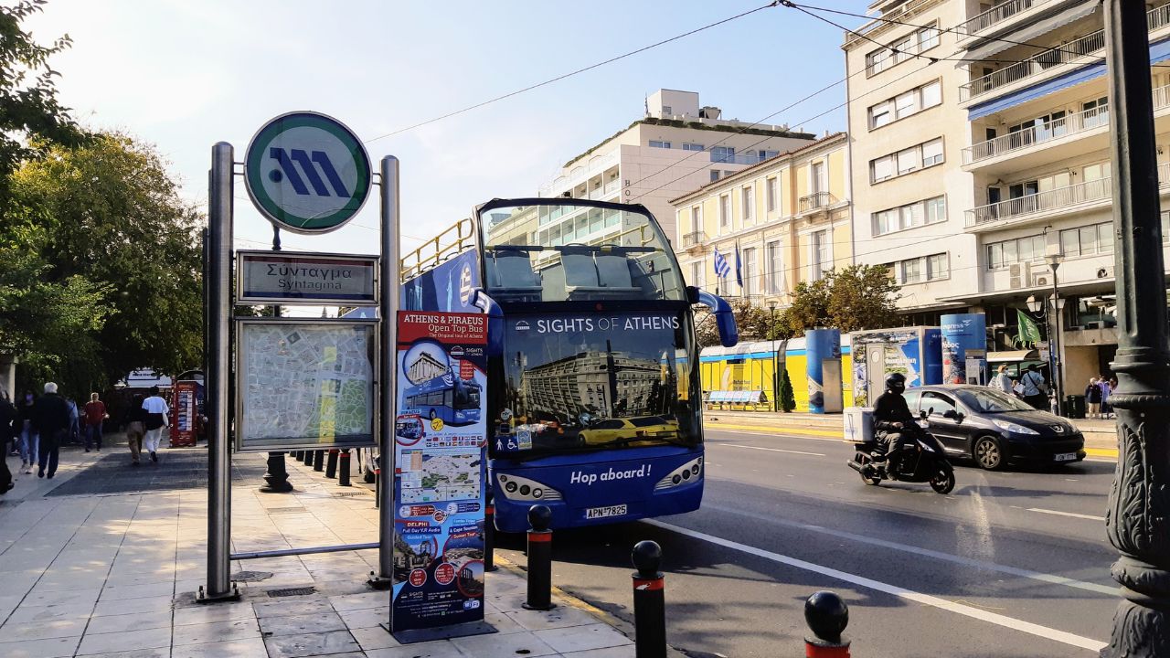 The blue hop on hop off bus can be a good way of getting around to see the sight when planning a 4 days in Athens itinerary