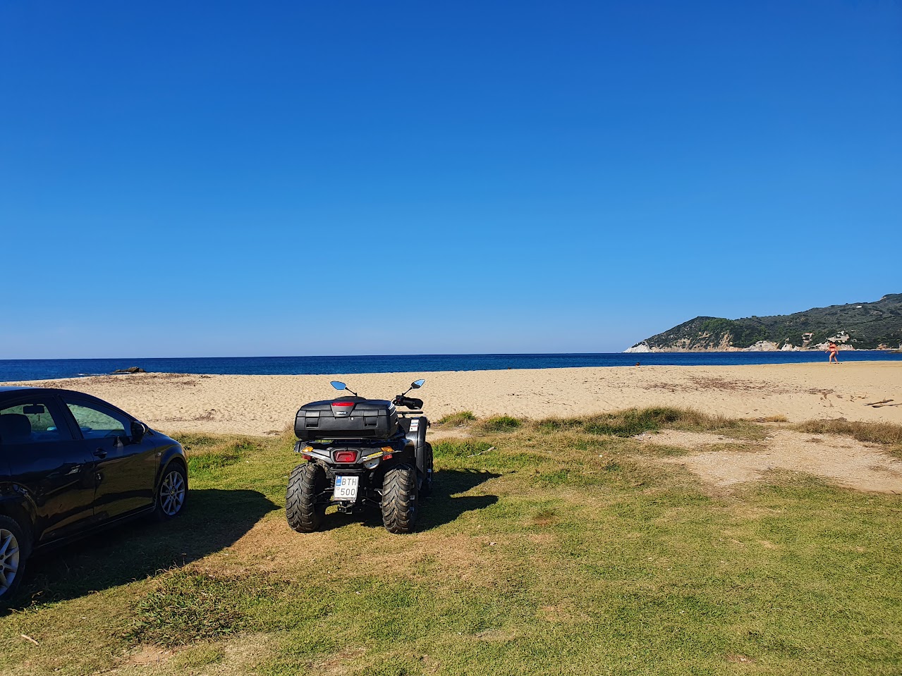 rental car and atv by beach in skiathos